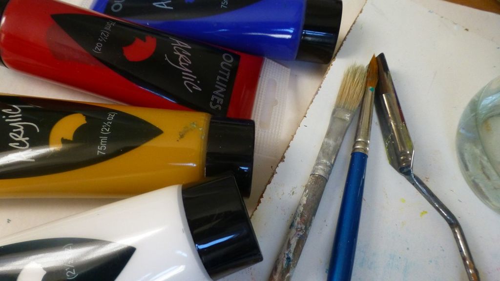 paints, brushes and pallette knife